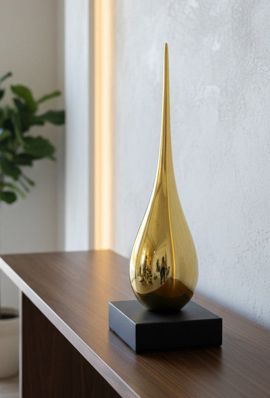 Mirror Finish Golden Sculpture on Black Base | Luxury Home Accent
